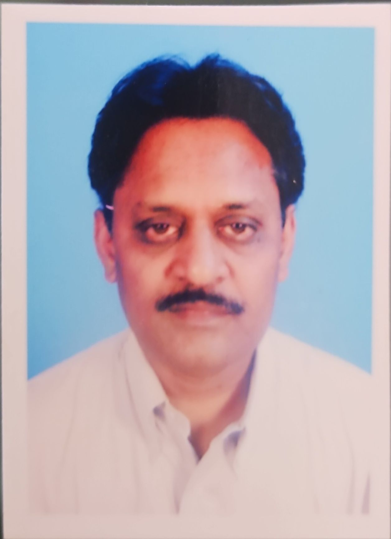 Dr. Asokan T